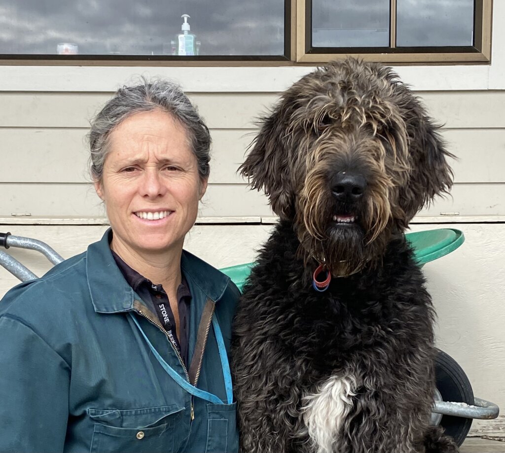 Jennie Macky with Fred, her 1-year-old labradoodle